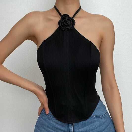 Top corsetto con schiena scoperta e allacciatura a collo alto con applicazioni floreali 