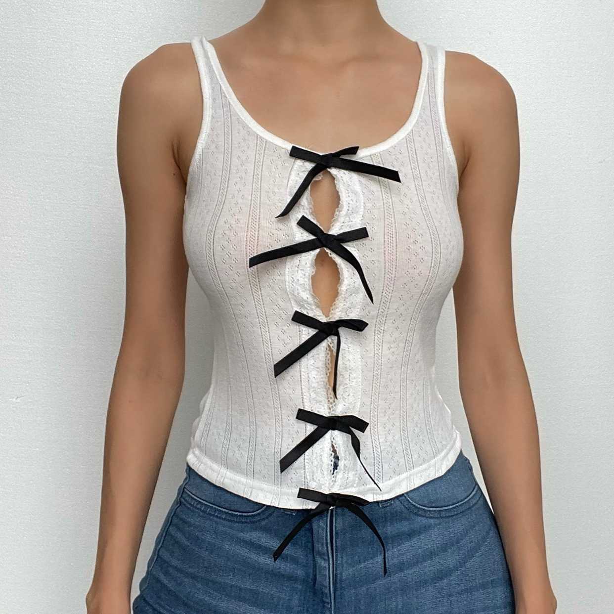 Bowknot hollow out contrast sleeveless textured top