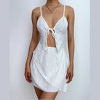 Textured solid cross back self tie backless v neck mini skirt set