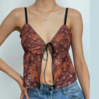 Top corto con scollo a V e schiena scoperta con stampa floreale in rete 