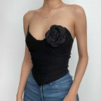 Top a corsetto con scollo a V senza schienale e applicazioni floreali 