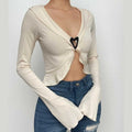 Ribbed flared sleeve heart applique ruffle v neck crop top