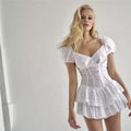 “Summer Child” Ruffled White Romper