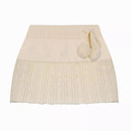 Gonna micro Y2K in maglia a trecce con dettaglio pompon