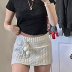 Gonna micro Y2K in maglia a trecce con dettaglio pompon
