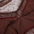 Top corto senza maniche in rete con volant patchwork 