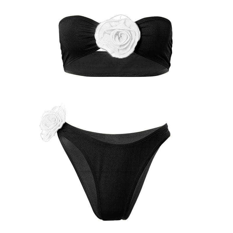 Completo pantaloni a tubo con schiena scoperta e applicazioni floreali a contrasto 