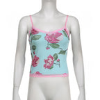 Top in rete a contrasto con scollo a V e stampa floreale con orlo in pizzo 