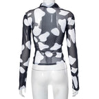Top a collo alto a contrasto con maniche lunghe e rete trasparente 