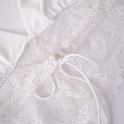 Top corto con laccetti allacciati alla schiena e scollo a V in patchwork di pizzo