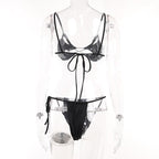 Completo pantaloni canotta con lacci e schiena scoperta con incrocio sul davanti