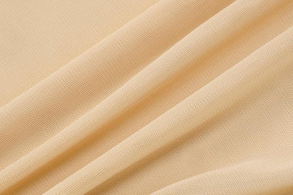 Ärmelloses Midikleid aus transparentem Netzstoff mit Rüschen und Blumenapplikation