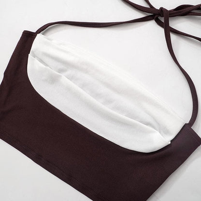 Top corto con schiena scoperta e lacci a contrasto con patchwork 