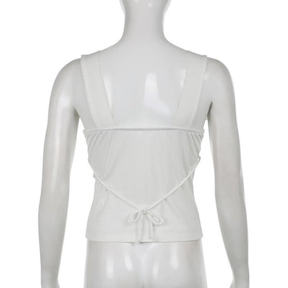 Top senza maniche con laccetti e scollo a V in patchwork di pizzo