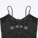 Top corto in denim con scollo a V, zip e schiena scoperta 