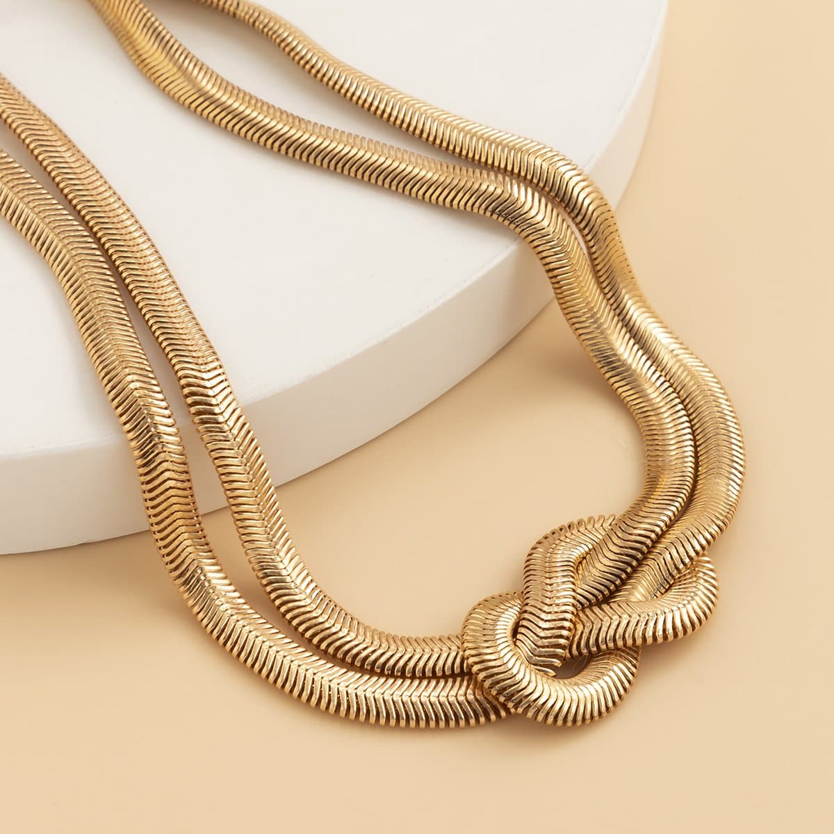 Knotted snake choker necklace