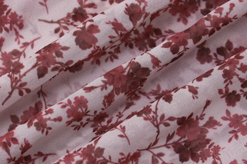 Abito lungo senza maniche con scollo a V e schiena scoperta a contrasto con stampa floreale in chiffon 