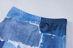 Minigonna in denim con stampa a O e maniche lunghe, collo alto e traforato 