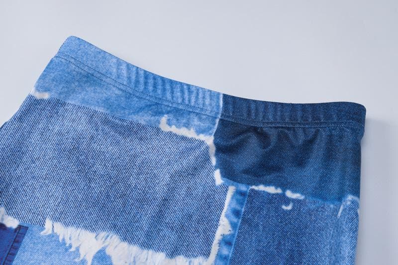 Minigonna in denim con stampa a O e maniche lunghe, collo alto e traforato 