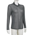 Top a collo alto con maniche lunghe e rete trasparente 