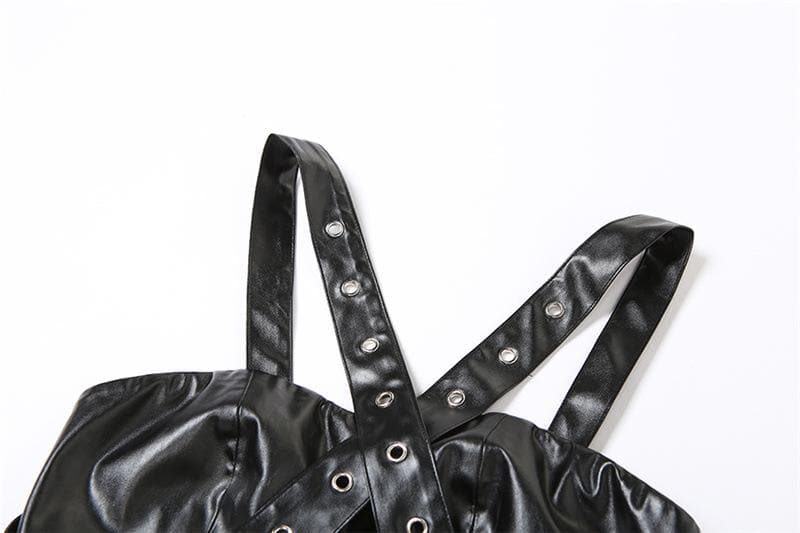 Top corto in pelle PU traforata con bottoni e schiena incrociata 