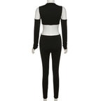 Einfarbiger Jumpsuit mit überkreuzten Ärmeln und ausgehöhlten Schultern und O-Ring 
