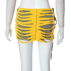 Contrast low cut hollow out self tie irregular mini skirt