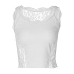 Top corto in pizzo senza maniche con scollo a U e patchwork in tinta unita 