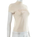Top a maniche corte con collo alto e perline 