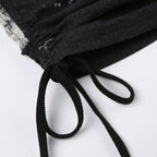Top corto a maniche corte con patchwork a contrasto e tie-dye con coulisse 