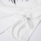 Irregular v neck drawstring ribbed butterfly pattern cami top