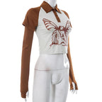 Top corto con colletto rovesciato, maniche corte, bottoni, guanti e patchwork a contrasto 