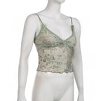 Top corto con scollo a V e orlo in pizzo con stampa floreale in rete trasparente 