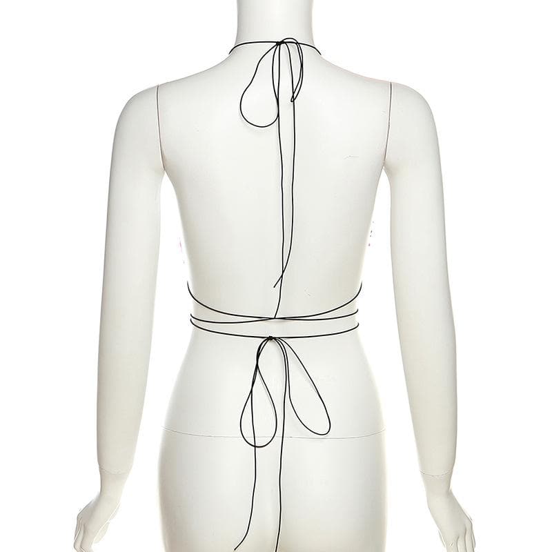 Reggiseno con anello a O e stampa leopardata pelosa con lacci e apertura sulla schiena 