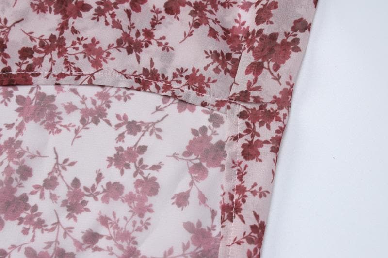 Abito lungo senza maniche con scollo a V e schiena scoperta a contrasto con stampa floreale in chiffon 