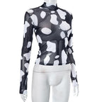 Top a collo alto a contrasto con maniche lunghe e rete trasparente 
