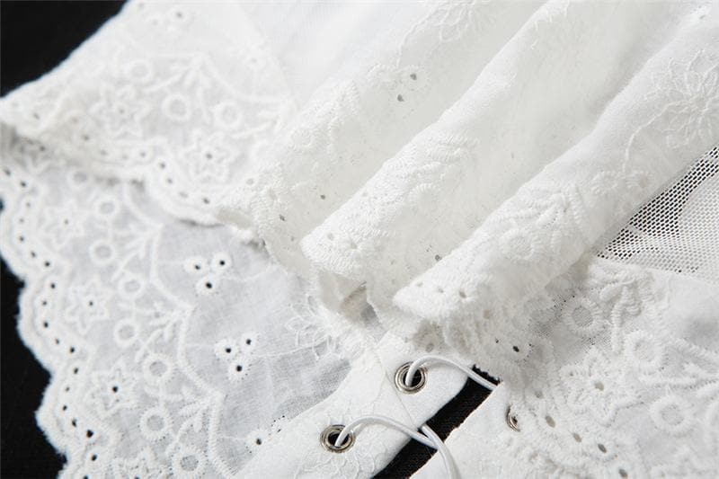Top corto senza maniche con lacci e schiena scoperta, strutturato e scollato
