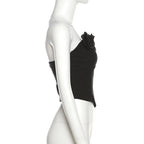 Top a corsetto con scollo a V senza schienale e applicazioni floreali 