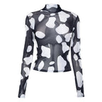 Top a collo alto a contrasto con maniche lunghe e rete trasparente 