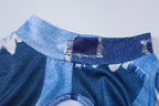 Minigonna in denim con stampa a O e maniche lunghe, collo alto e traforato 