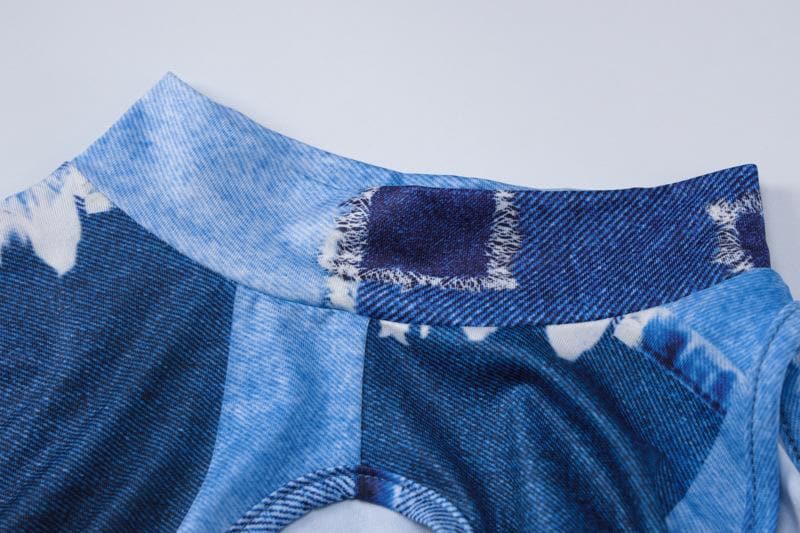 Minigonna in denim con stampa a O e maniche lunghe, collo alto e traforato 