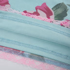 Top in rete a contrasto con scollo a V e stampa floreale con orlo in pizzo 
