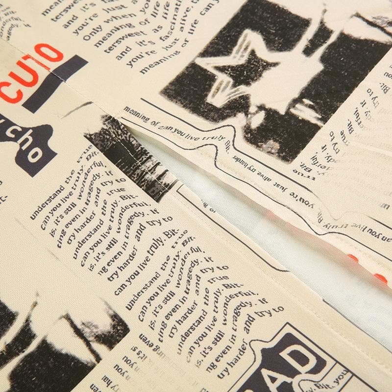 Gonna midi a vita alta con spacco e stampa di giornale a contrasto 