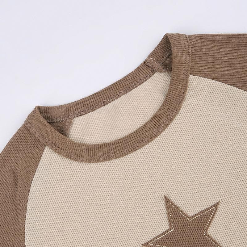 Maglia a maniche lunghe con scollo rotondo e coste a contrasto con patchwork di stelle 