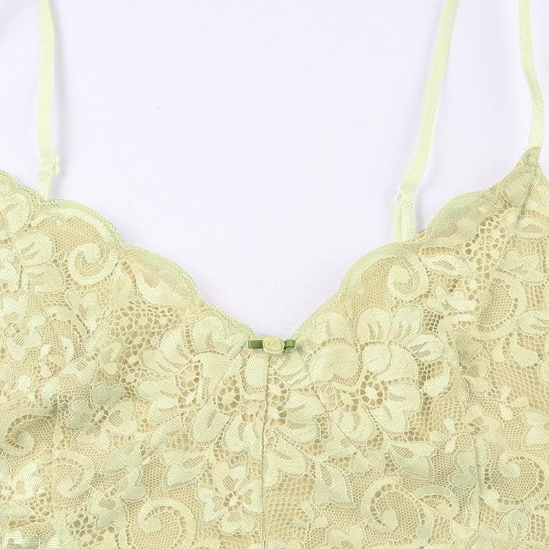 Top corto in pizzo con scollo a V e schiena scoperta, applicazioni floreali a contrasto