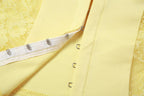 Top corto in pizzo tinta unita con scollo a U e bottoni 