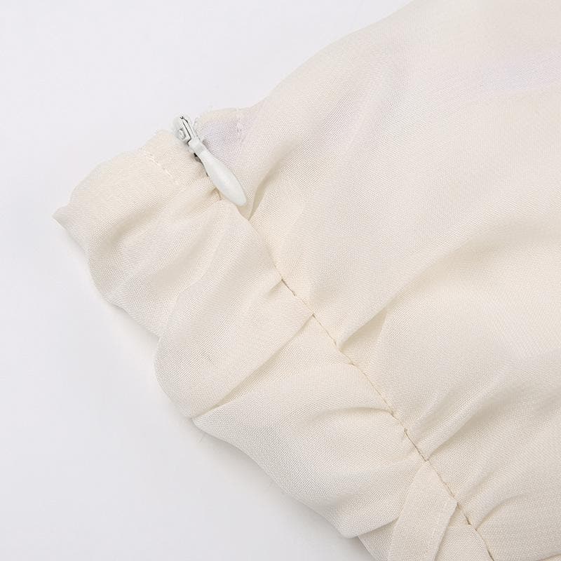 Top a tubino in chiffon arricciato, con cerniera e schiena scoperta 