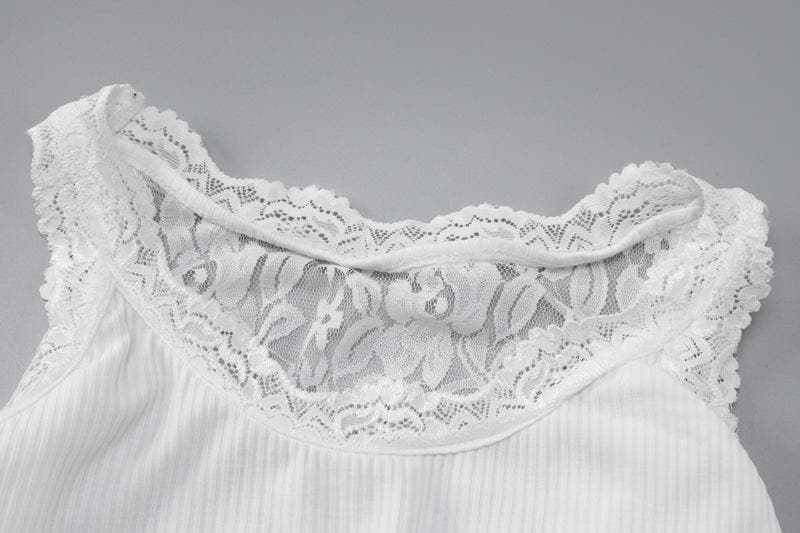 Top corto in pizzo senza maniche con scollo a U e patchwork in tinta unita 