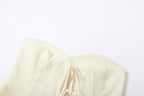 Solid zip-up sweetheart neck irregular self tie tube top