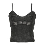 Top corto in denim con scollo a V, zip e schiena scoperta 